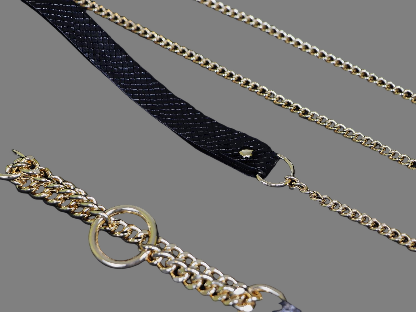 Close-up detail of adjustable buckle closure on faux leather choker