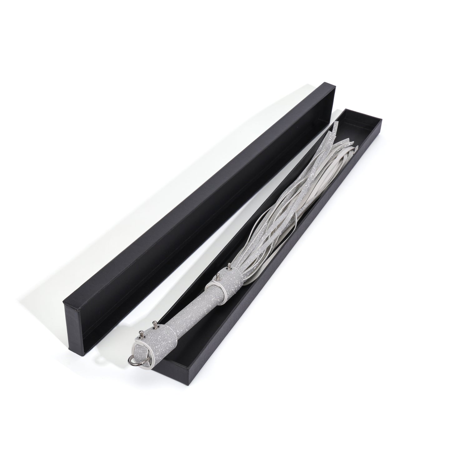 Ever Gleam glitter performance tassel displayed in packaging box