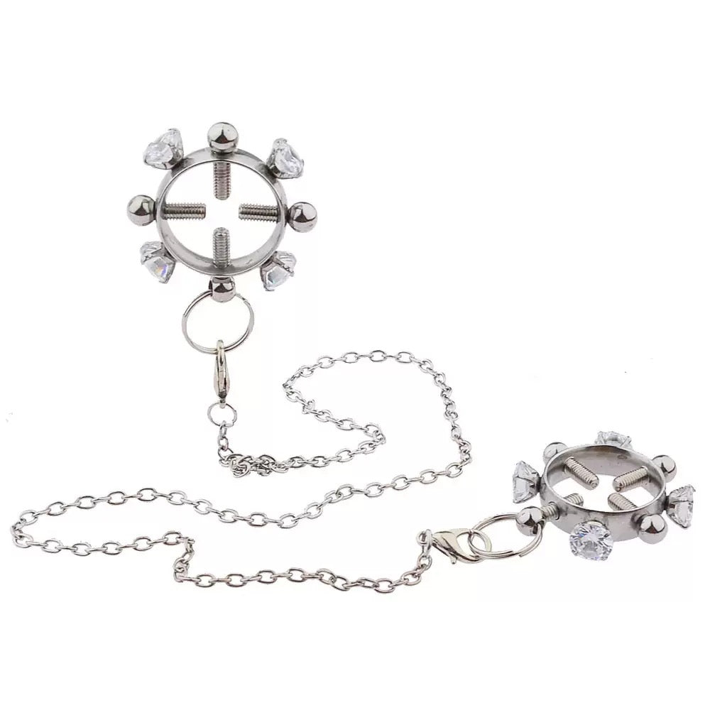 Abrazadera para pezón de acero inoxidable con cuatro tornillos y diamantes de imitación, con cadena y campana.