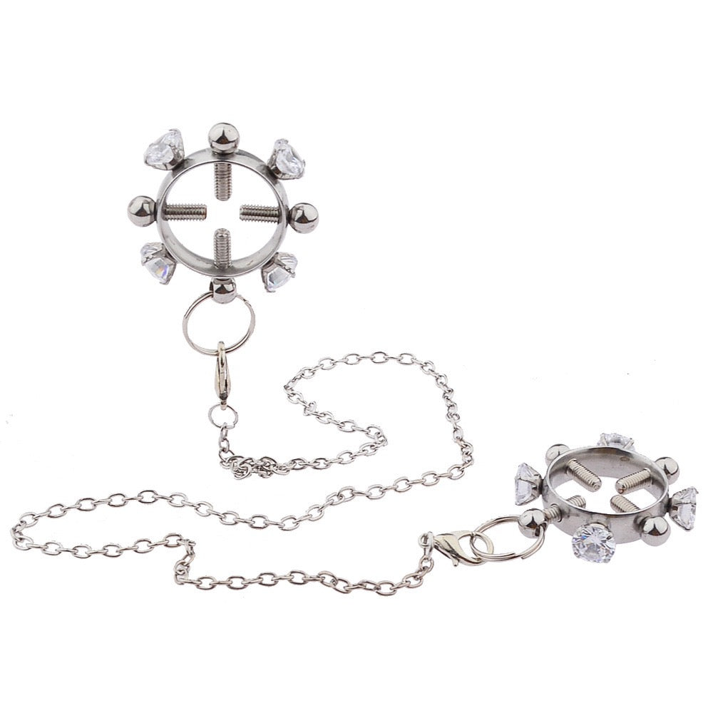 Abrazadera para pezón de acero inoxidable con cuatro tornillos y diamantes de imitación, con cadena y campana.
