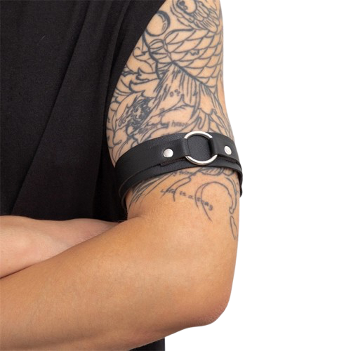 Adjustable leather arm band shown worn on upper arm