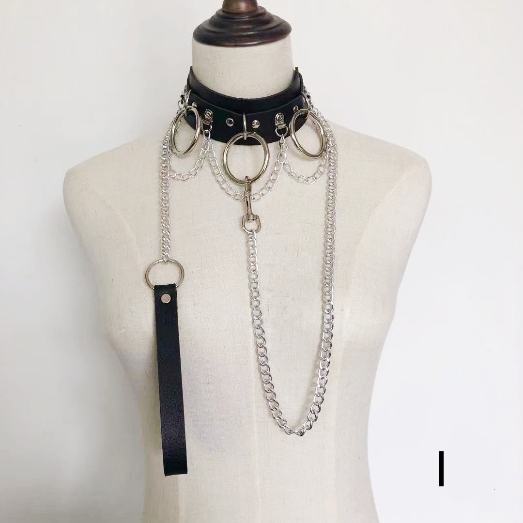 Faux leather choker featuring layered chain and hoop details