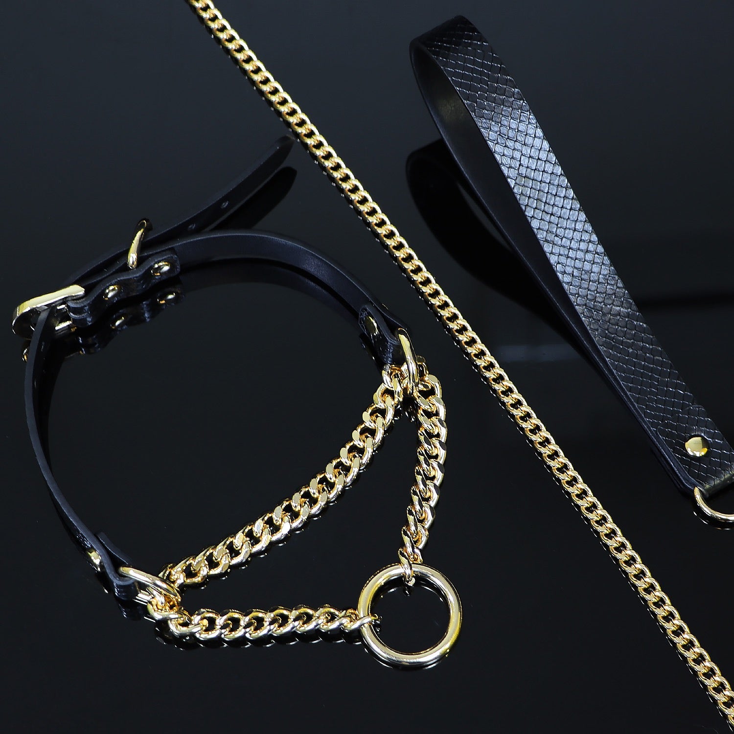 Close-up detail of chain link hardware on faux leather choker