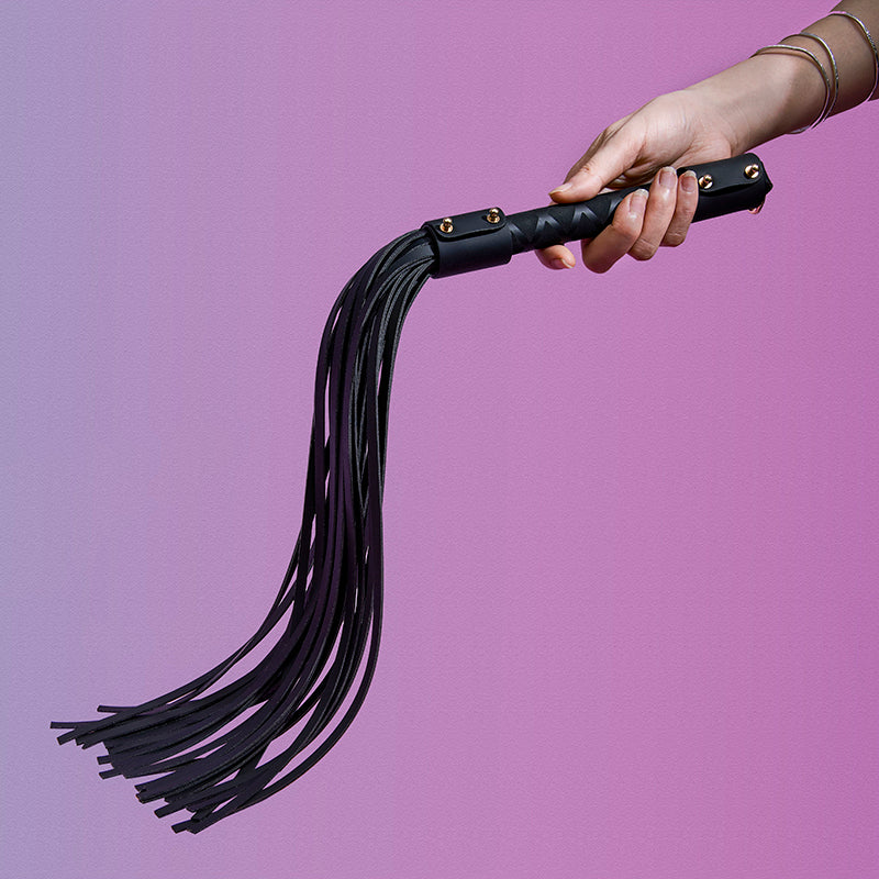 Handmade heat reactive leather tassel accessory in original burgundy color