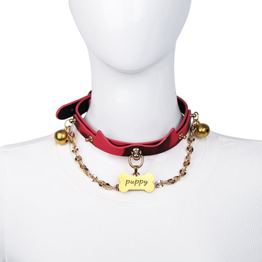 Heat reactive gold bell choker displayed on mannequin neck
