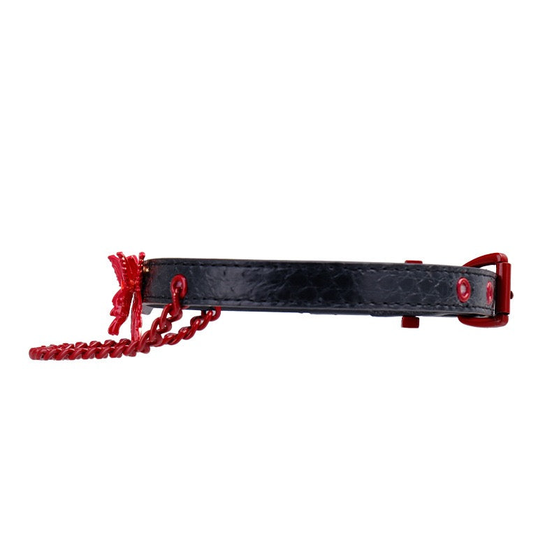 Adjustable genuine leather butterfly choker with decorative chain detailing