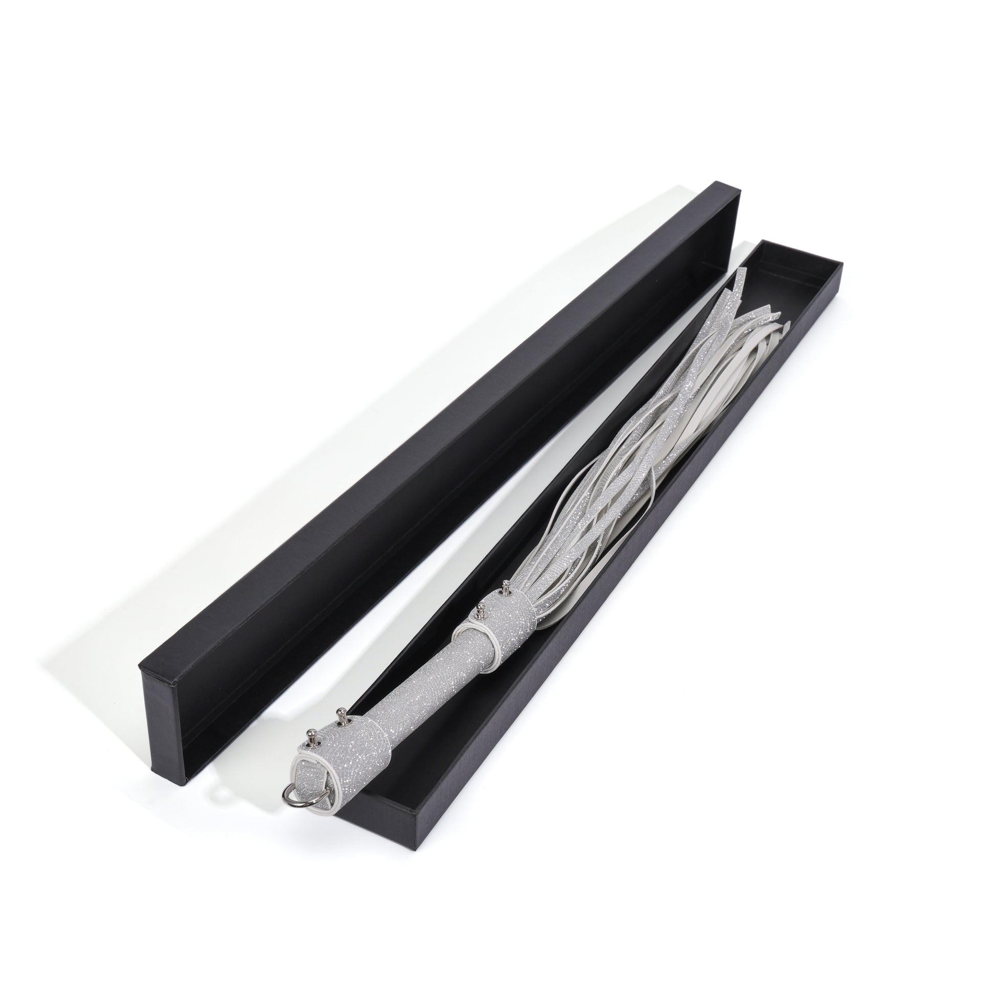 Ever Gleam glitter performance tassel displayed in packaging box