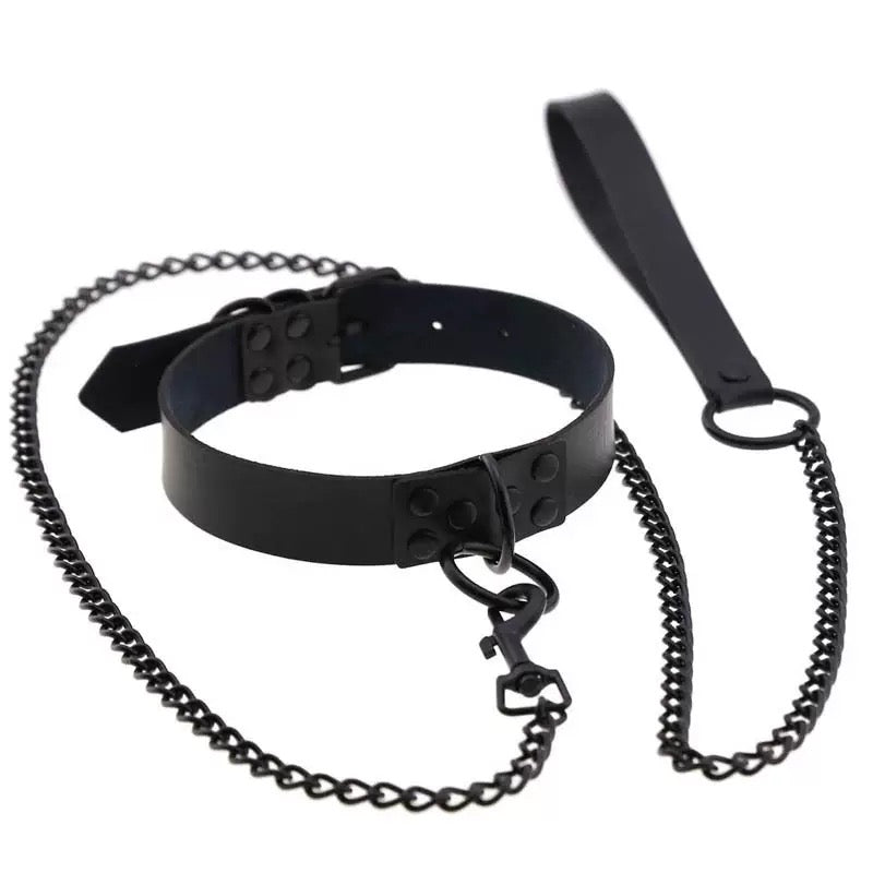 hardware detail of black faux leather chocker with chain accessory