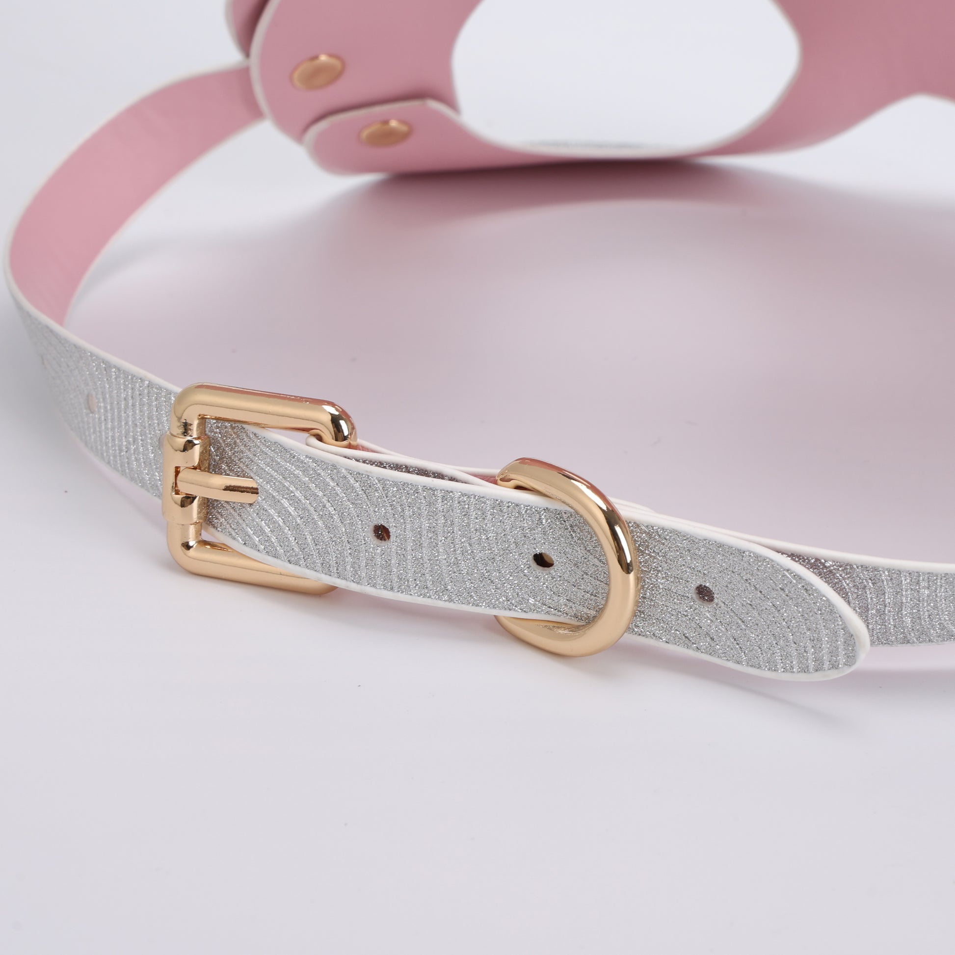 Close-up detail of adjustable buckle on glitter studded bunny mask
