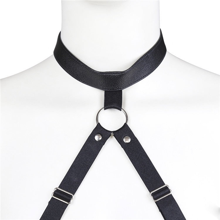 Close-up detail of metal ring hardware at neckline