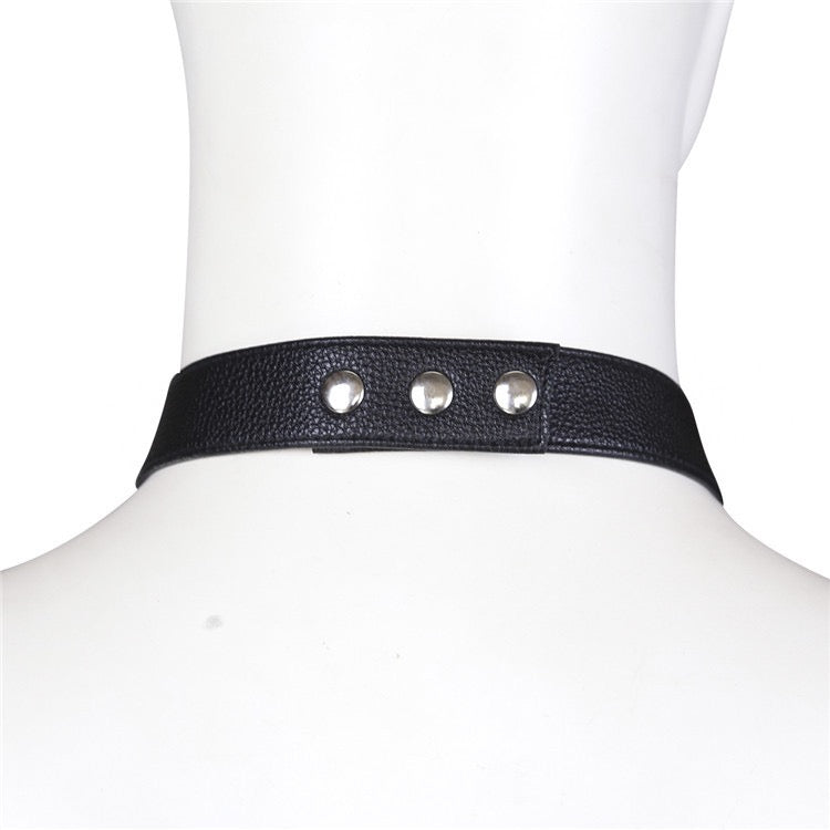 Close-up detail of halter neck strap on men’s harness thong