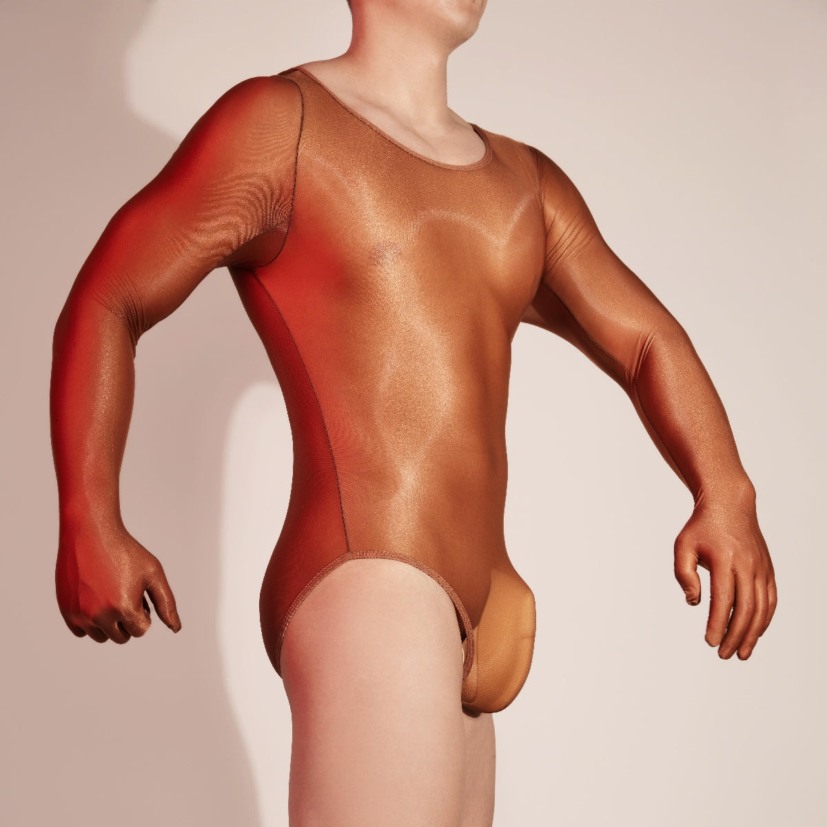 Left side profile of bronze men’s sheer gloved bodysuit