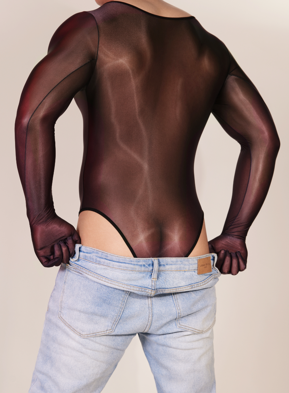 Fashion styling look featuring men’s sheer gloved bodysuit