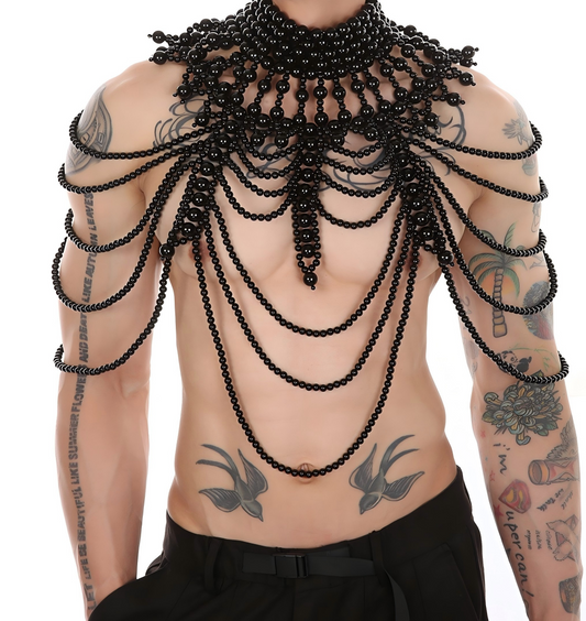 Black layered pearl cape top worn by model
