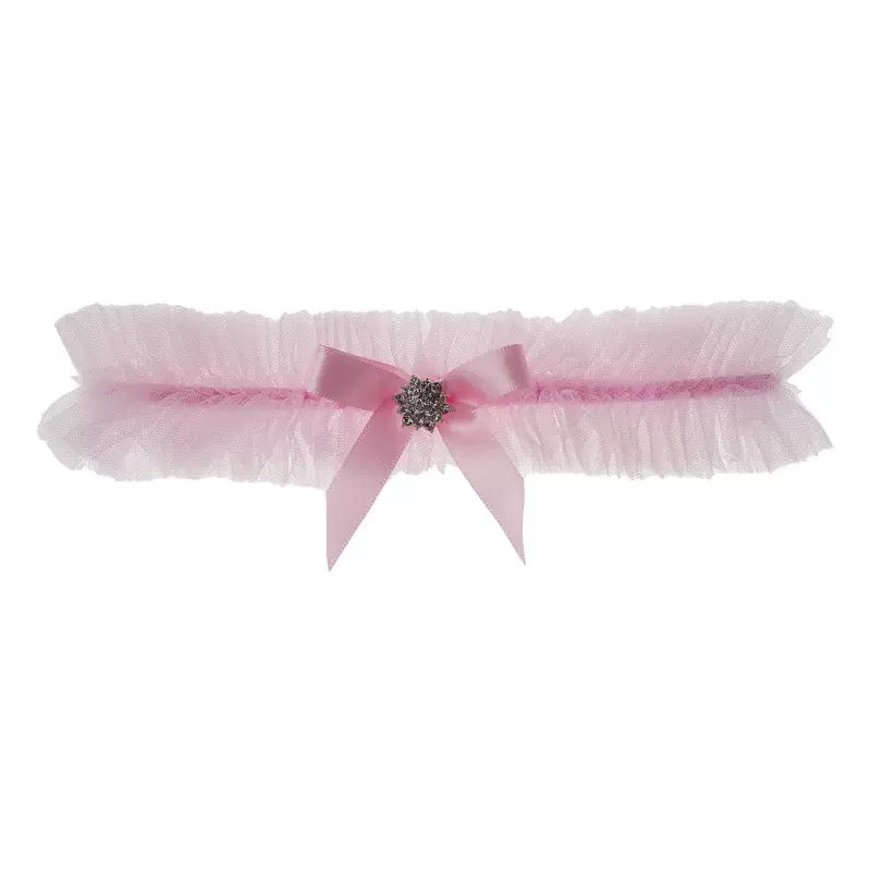 Pink stretch rhinestone bow leg accessory with rhinestone centerpiece