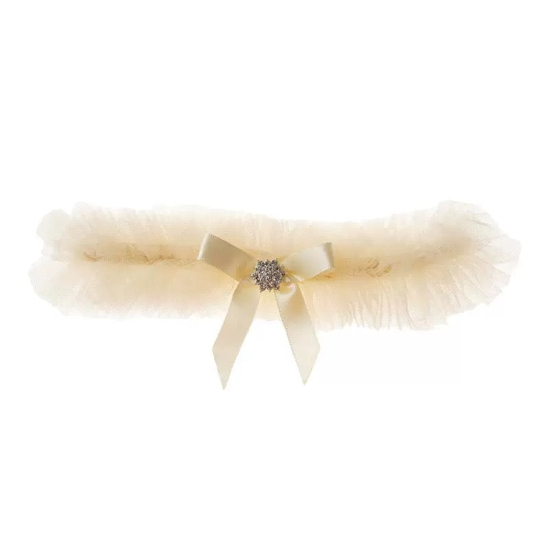 Yellow stretch rhinestone bow leg accessory with elastic fit